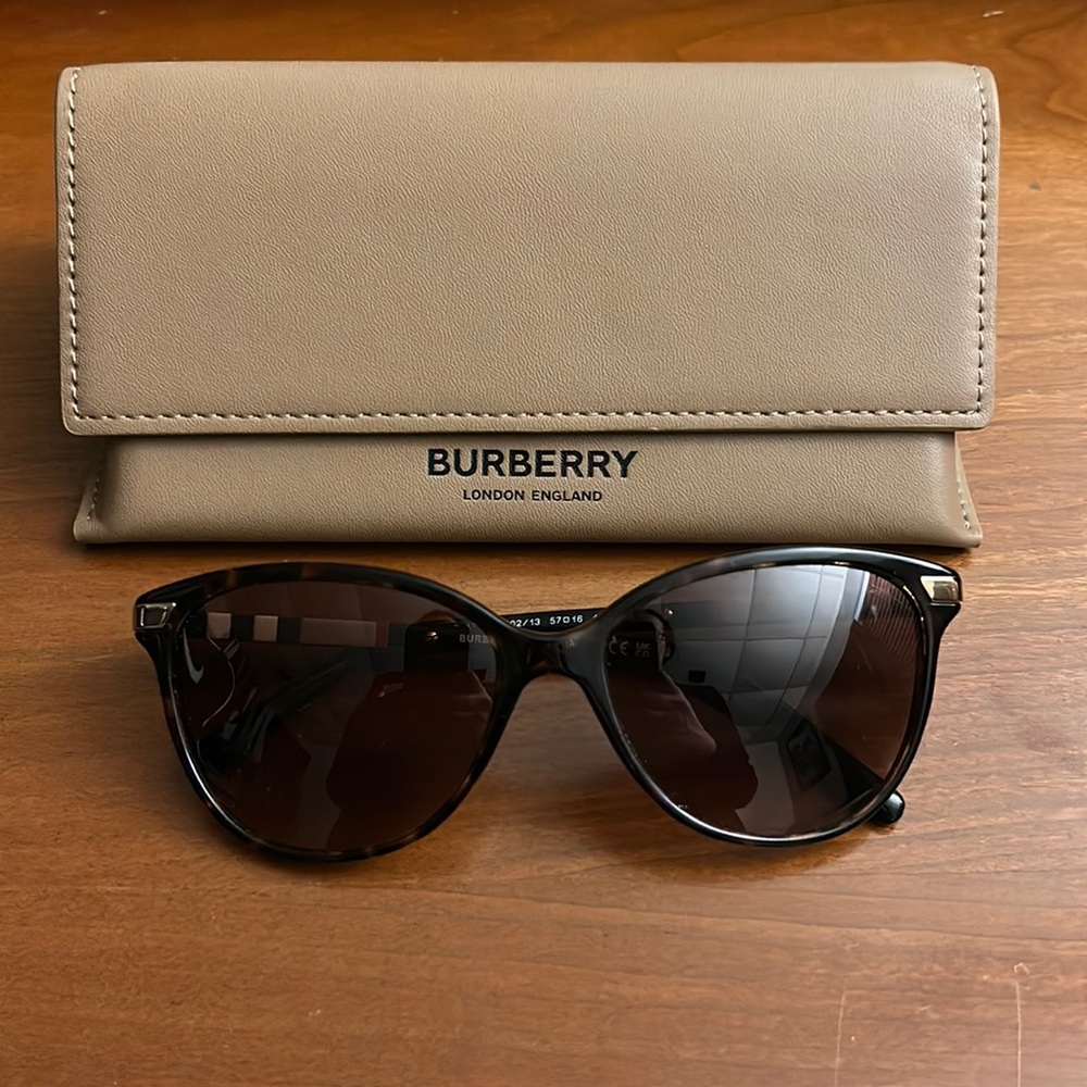 Burberry sunglasses.  COLOR:  TORTOISE/BROWN GRADIENT
